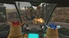 View from a cockpit looking out at a battlefield with explosions and characters. Produktbild-Vorschau