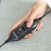 A hand holding a black electronic controller with a red indicator light and a dial. Náhled obrázku produktu