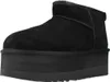 A black UGG boot with a platform sole is shown against a white background. Voir les images du produit