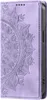A close-up view of a purple flip phone case with a mandala design. Produktbild-Vorschau