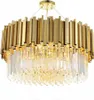 A close-up studio shot of a gold and crystal chandelier. Anteprima dell’immagine prodotto