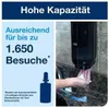 A hand using a soap dispenser in a bathroom. Produktbild-Vorschau