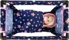 A top-down view of a doll's travel crib with a doll inside. Produktbild-Vorschau
