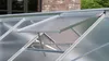 Close-up view of an open greenhouse roof vent. Produktbild-Vorschau