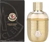 A product shot of Moncler Sunrise Pour Femme perfume and its packaging. Produktbild-Vorschau