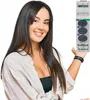 A woman is holding an electrical component in front of a white background. Náhľad obrázku produktu