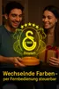 A couple is holding a Galatasaray themed LED lamp and a gift box. Produktbild-Vorschau