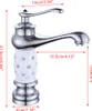 A close-up studio shot of a single bathroom faucet with dimensions indicated by measurement lines and text. Podgląd zdjęcia produktu