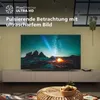 A modern living room scene with a large TV displaying a starry night sky over mountains, placed on a minimalist TV stand. Náhled obrázku produktu