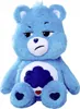 A blue plush toy bear with a grumpy expression sits on a white background. Anteprima dell’immagine prodotto
