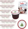 A set of glass jars with lids, a jar of jam, a recipe book, and a decorative plate, all with a Christmas theme. Produktbild-Vorschau