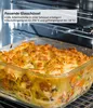 A glass baking dish filled with a casserole is shown inside an oven. Anteprima dell’immagine prodotto