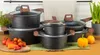 A set of cookware with vegetables and flowers in the background. Produktbild-Vorschau
