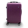A purple suitcase on a white background. Produktbild-Vorschau