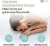 A woman sleeping peacefully on a bed, with marketing text and icons highlighting product features. Produktbild-Vorschau