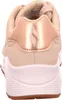 The back view of a beige sneaker with rose gold accents. Anteprima dell’immagine prodotto