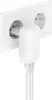 A white Belkin power adapter plugged into a white electrical outlet. Produktbild-Vorschau