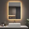 A modern bathroom vanity with a sink and an illuminated mirror. Náhľad obrázku produktu