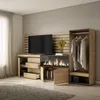 A modern bedroom or living room setting with a large media console featuring a fireplace and an open wardrobe. Produktbild-Vorschau