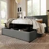 A bedroom scene with a bed that has storage underneath. Náhled obrázku produktu