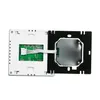 The back of a smart digital thermostat is shown, revealing its internal components and mounting bracket. Náhled obrázku produktu