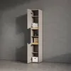 A tall, narrow cabinet with open shelves and closed compartments, standing against a textured gray wall. Produktbild-Vorschau