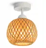 A single ceiling light fixture with a woven bamboo shade. Produktbild-Vorschau