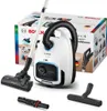 A Bosch Serie 6 vacuum cleaner and its accessories are displayed with its packaging. Podgląd zdjęcia produktu