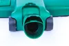 Close-up of the suction nozzle of a green vacuum cleaner attachment. Produktbild-Vorschau