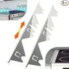 Two white stove gap covers are shown against a white background, with a small inset image showing them installed on a stove. Anteprima dell’immagine prodotto