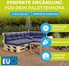 A modular sofa made of wooden pallets with navy blue cushions on a wooden deck, with greenery in the background. Produktbild-Vorschau