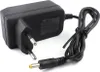 A black power adapter with a coiled cable and a connector plug. Anteprima dell’immagine prodotto