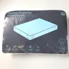 The image shows the packaging of a mattress protector with graphics and text detailing its features. Voir les images du produit