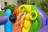 A young child playing with a colorful inflatable toy in an outdoor setting. Voir les images du produit