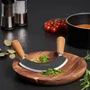A kitchen scene with a chopping board, herbs, and cooking utensils. Anteprima dell’immagine prodotto
