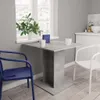 A dining table and chairs set in a kitchen or dining area, near a window. Produktbild-Vorschau