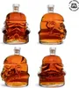 Four views of a Stormtrooper helmet-shaped glass decanter filled with amber liquid. Produktbild-Vorschau