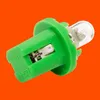 A single green plastic-based light bulb with a clear glass bulb, set against an orange background. Produktbild-Vorschau