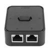 A black network switch with two RJ45 ports on the front and a toggle switch on top. Anteprima dell’immagine prodotto