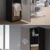 Two close-up shots of a laundry cabinet, one showing towels in a basket and the other showing an iron inside. Produktbild-Vorschau