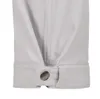 Close-up of a cuff on a pair of pants, showing a button closure. Produktbild-Vorschau
