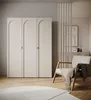 A bedroom or dressing room setting with a wardrobe, chair, and decorative elements. Produktbild-Vorschau