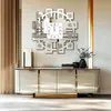 A modern living room with a sideboard and a decorative clock on the wall. Anteprima dell’immagine prodotto