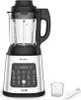 A silver and black Moulinex blender with a digital display and various function icons is shown against a white background. A small clear plastic cup and a cleaning brush are placed to the right of the blender. Voir les images du produit