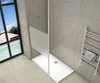 A modern bathroom with a walk-in shower, a towel rack, and a large window overlooking a tropical scene. Produktbild-Vorschau