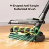 Close-up of a vacuum cleaner head with a motorized brush on a wooden floor, showing airflow and debris being picked up. Náhled obrázku produktu