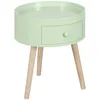 A light green round side table with a drawer and three wooden legs, shown against a white background. Voir les images du produit