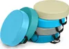 A stack of round, colorful seat cushions with handles. Podgląd zdjęcia produktu