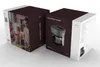 Two boxes for a kitchen appliance, one with a family photo and the other displaying the appliance. Produktbild-Vorschau