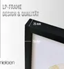 A close-up of a black picture frame, highlighting its dimensions and design. Podgląd zdjęcia produktu
